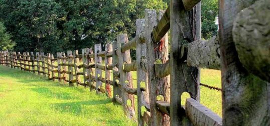 wooden post and rail fence